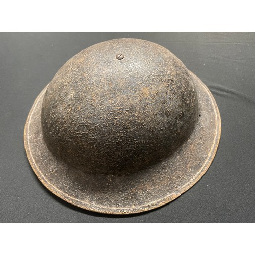 3238 - WW2 South African Steel helmet with textured olive green overpaint on top of the original khaki pain... 