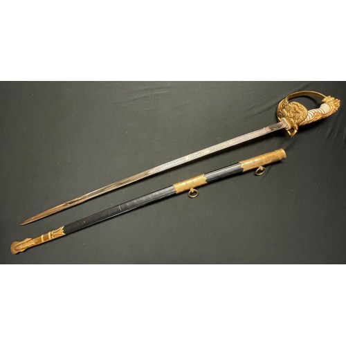 3324 - Kreigsmarine Officers Lion Head Sword with pipe backed blade 810mm in length with etched decoration ... 