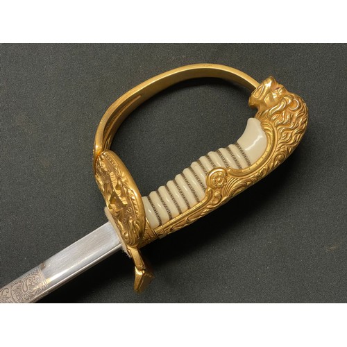 3324 - Kreigsmarine Officers Lion Head Sword with pipe backed blade 810mm in length with etched decoration ... 