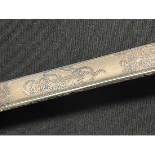 3324 - Kreigsmarine Officers Lion Head Sword with pipe backed blade 810mm in length with etched decoration ... 