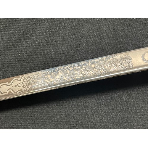 3324 - Kreigsmarine Officers Lion Head Sword with pipe backed blade 810mm in length with etched decoration ... 