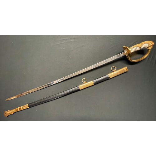 3324 - Kreigsmarine Officers Lion Head Sword with pipe backed blade 810mm in length with etched decoration ... 