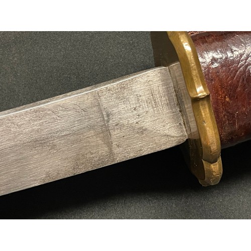 3325 - WW2 Japanese Katana . 700mm long single edged blade. Overall length 950mm. Grip has a leather cover.... 