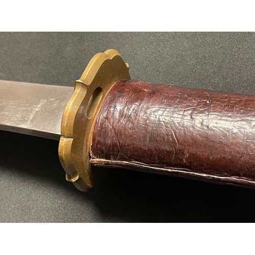 3325 - WW2 Japanese Katana . 700mm long single edged blade. Overall length 950mm. Grip has a leather cover.... 