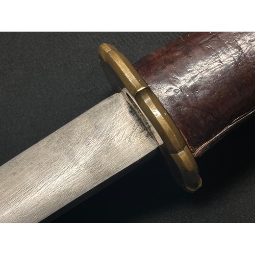 3325 - WW2 Japanese Katana . 700mm long single edged blade. Overall length 950mm. Grip has a leather cover.... 