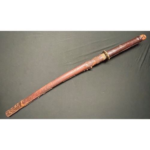 3325 - WW2 Japanese Katana . 700mm long single edged blade. Overall length 950mm. Grip has a leather cover.... 