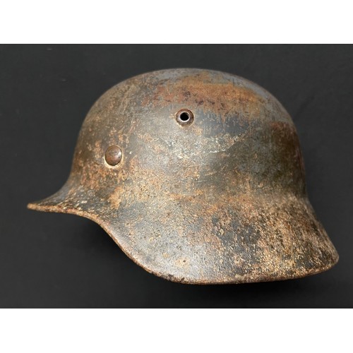 3326 - WW2 Third Reich Luftwaffe double decal M35 steel helmet. Remains of winter camo overpaint remaining ... 