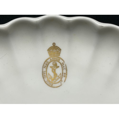 3349 - A porcelain comport and a dinner plate, transfer-printed in gold with the Admiralty seal device surm... 