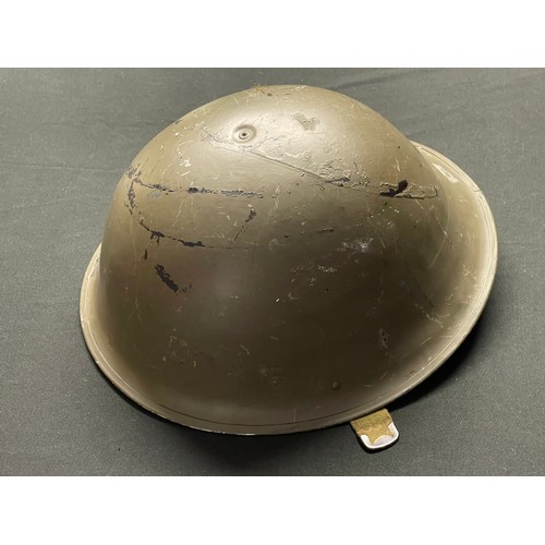 3365 - British MKIV Steel Helmet. Complete with liner and chinstrap. Dated 1952. Size 7 1/2.