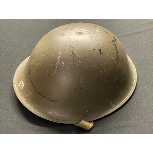 3365 - British MKIV Steel Helmet. Complete with liner and chinstrap. Dated 1952. Size 7 1/2.