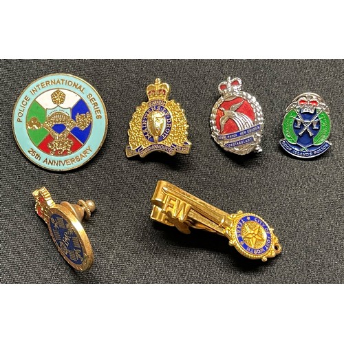 3377 - A collection of British Police insignia, buttons, numerals, enamel badges etc to include: a Greater ... 