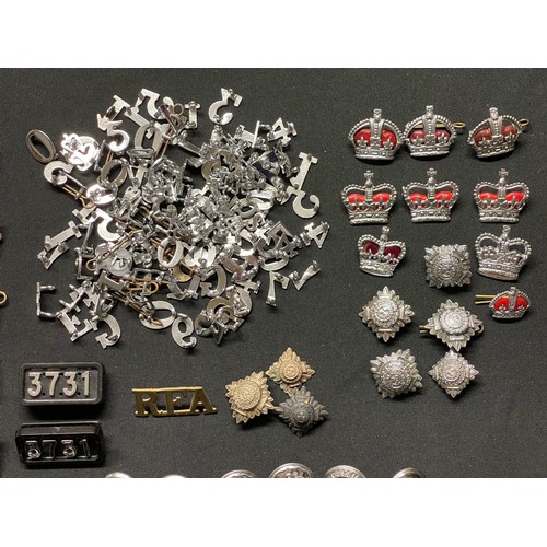 3377 - A collection of British Police insignia, buttons, numerals, enamel badges etc to include: a Greater ... 