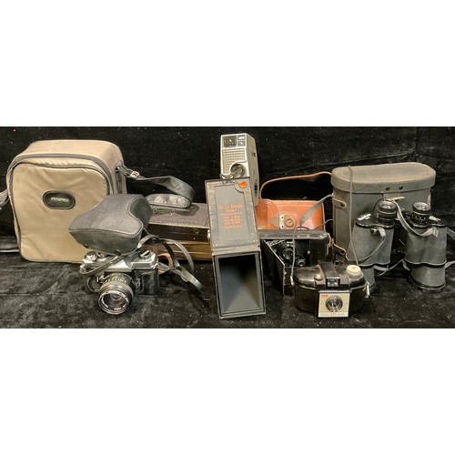 493 - Cameras - a Praktica MTL 5B 35mm camera, Pentacon auto lens, soft carry case; a Kodak concertina fol... 