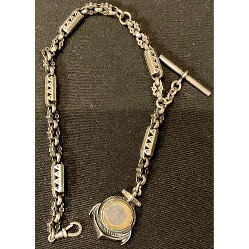 528 - A Victorian silver coloured metal fancy link Albert chain, with anchor compass fob