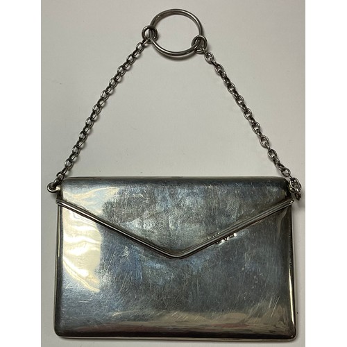 531 - A George V silver novelty card case as an envelope, hinged sprung cover, suspension chain with thumb... 