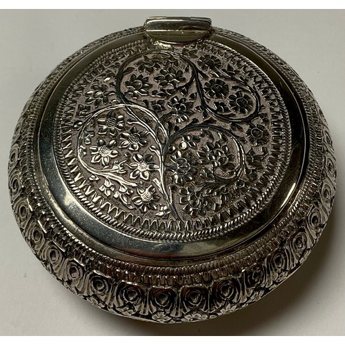 543 - An Anglo-Indian circular pot and cover, hinged cover, chased and engraved with foliate scrolls, 8cm ... 