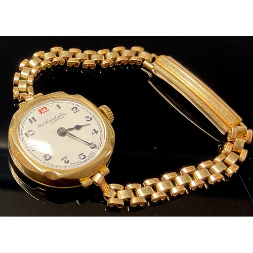 634 - A 9ct gold lady's watch, white enamel dial with Arabic numerals, the case marked 375, Thomas Russell... 