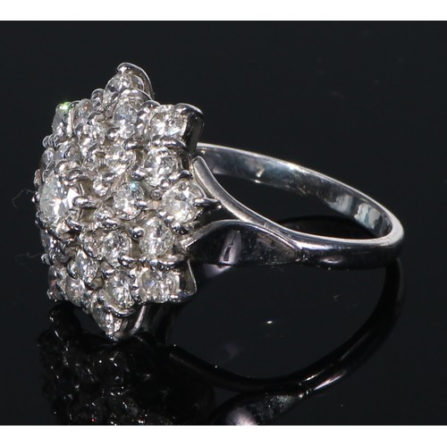 643 - An 18ct gold diamond cluster ring, size M, 8.2g