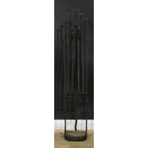 204 - An Art Deco inspired iron hall stand, in the manner of Edgar William Brandt, with provision for walk... 