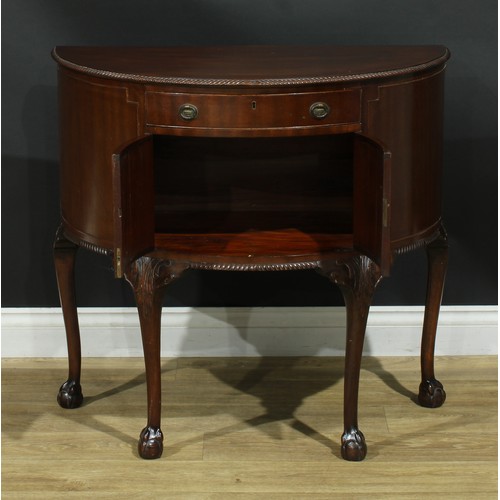 205 - A George III Revival mahogany demilune side cabinet, 79cm high, 85cm wide, 44cm deep, c.1920