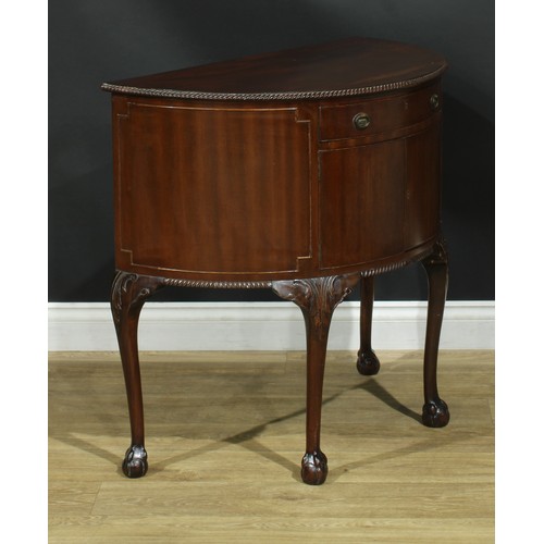 205 - A George III Revival mahogany demilune side cabinet, 79cm high, 85cm wide, 44cm deep, c.1920