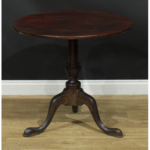 207 - A George III mahogany tripod occasional table, circular one-piece tilting top, turned column, cabrio... 