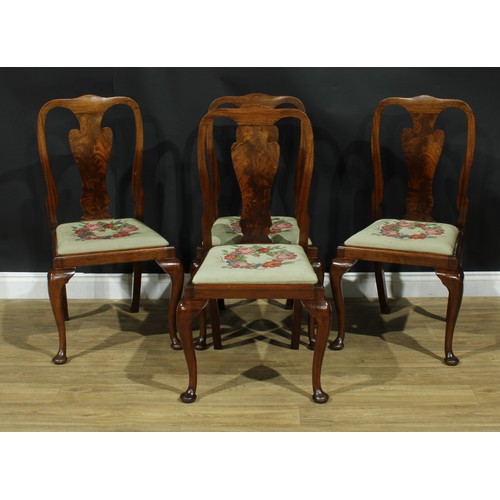 209 - A set of four Queen Anne Revival mahogany dining chairs, flame-veneered vasular splats, cabriole for... 