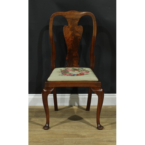 209 - A set of four Queen Anne Revival mahogany dining chairs, flame-veneered vasular splats, cabriole for... 