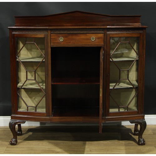 211 - A George III Revival mahogany bookcase or display cabinet, astragal glazed doors, blind fretwork fri... 