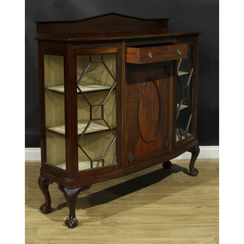 211 - A George III Revival mahogany bookcase or display cabinet, astragal glazed doors, blind fretwork fri... 