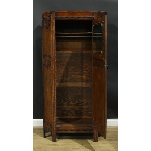 213 - An oak hall robe, 182.5cm high, 91.5cm wide, 42cm deep