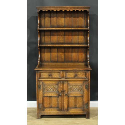 214 - An oak dresser, by Maple, 184cm high, 91.5cm wide, 45.5cm deep; a Jaycee oak bookcase, 136cm high, 9... 