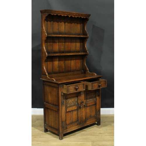 214 - An oak dresser, by Maple, 184cm high, 91.5cm wide, 45.5cm deep; a Jaycee oak bookcase, 136cm high, 9... 