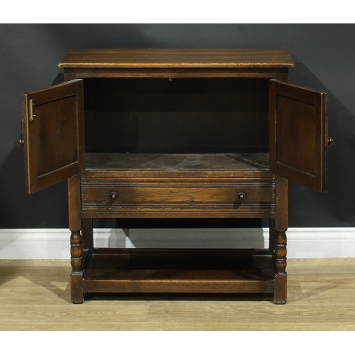 214 - An oak dresser, by Maple, 184cm high, 91.5cm wide, 45.5cm deep; a Jaycee oak bookcase, 136cm high, 9... 