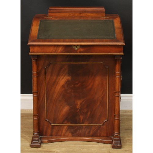 219 - A Regency style Davenport desk, 84cm high, 59cm wide, 51cm deep