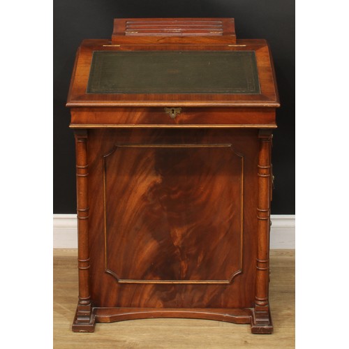 219 - A Regency style Davenport desk, 84cm high, 59cm wide, 51cm deep