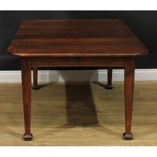 501 - A late Arts & Crafts period oak extending dining table, 68cm high, 104.5cm extending to 150.5cm long... 