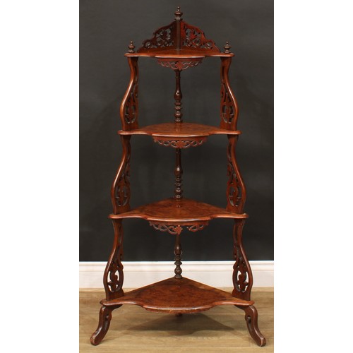 503 - A Victorian walnut four-tier corner whatnot, 127.5cm high, 68cm wide, 38cm deep; a similar serpentin... 