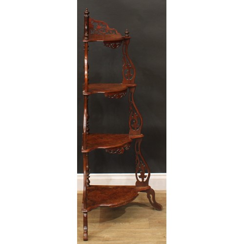 503 - A Victorian walnut four-tier corner whatnot, 127.5cm high, 68cm wide, 38cm deep; a similar serpentin... 