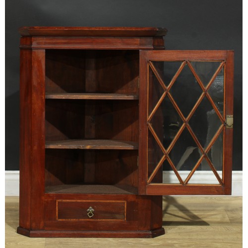 509 - A Sheraton Revival satinwood crossbanded mahogany splay front wall hanging corner display cabinet, a... 