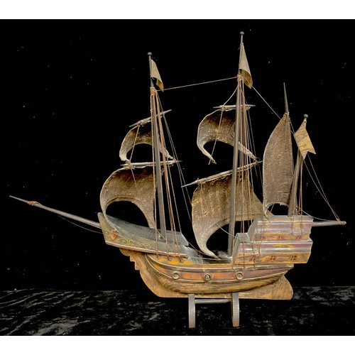 675 - A model galleon on stand, 59cm x 70cm