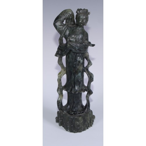 67A - A Chinese carved jade figure, of a courtesan holding a rabbit, 29cm high; another, holding a fan, 20... 