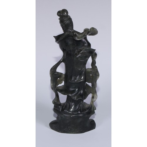 67A - A Chinese carved jade figure, of a courtesan holding a rabbit, 29cm high; another, holding a fan, 20... 