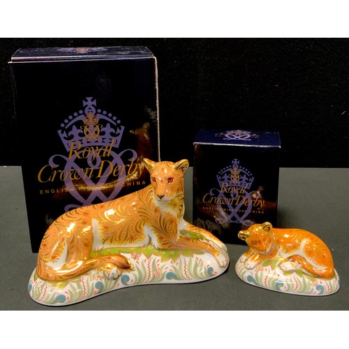 2 - A Royal Crown Derby Paperweight Lioness;  another Lion Cub, both gold stoppers, both boxed (2)