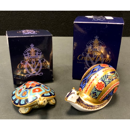 12 - A Royal Crown Derby Paperweight, Garden Snail. limited edition, 241/4500 gold stopper boxed;  anothe... 