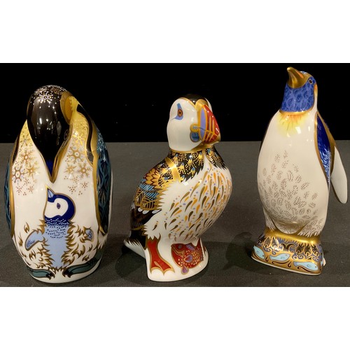 9 - A Royal Crown Derby paperweight, Emperor Penguin, gold stopper, boxed; others, Penguin and Chick, go... 