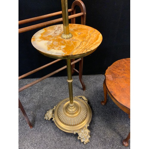 81 - A late 19th / early 20th century brass rise and fall standard lamp, converted for use with electrici... 