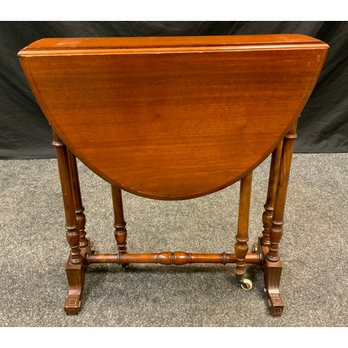 88 - A Victorian mahogany Sutherland table, oval top, turned supports, ceramic casters, 62cm tall x 60.5c... 