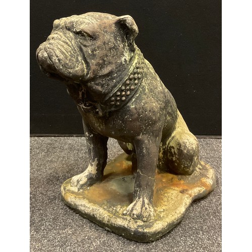 112 - Garden Statuary - a mid 20th century reconstituted stone statue of a British Bulldog, 43cm tall.