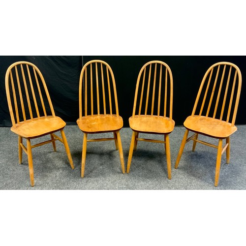 137 - A set of four elm and beechwood, Ercol style, spindle-back chairs, (4).